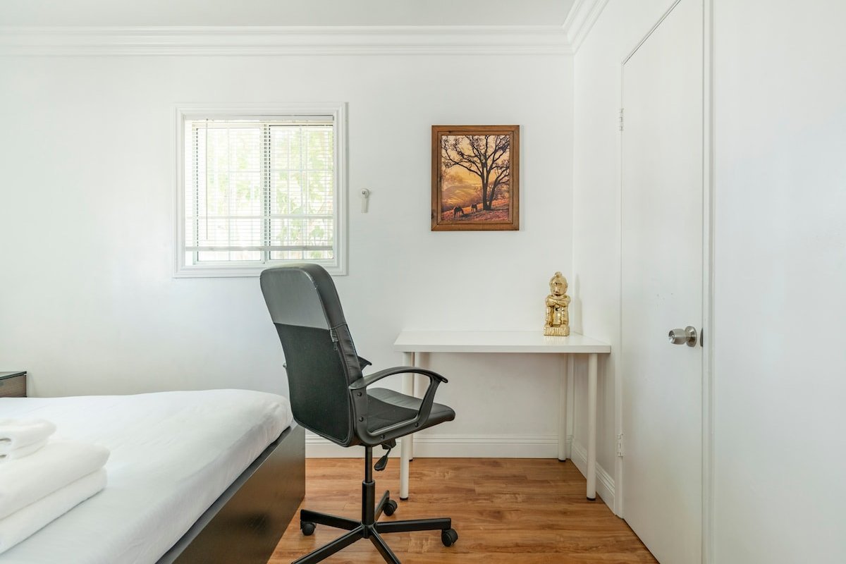 Spacious 7BR/5BA Triplex Home + Private Backyard gallery image 3